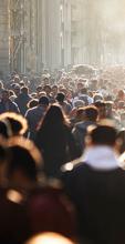 Crowd of people walking on the street