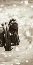 Photo of a tap issuing water resistance. from www.shutterstock.com