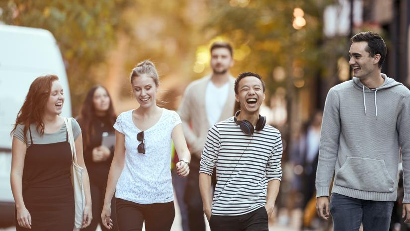 Bachelor of IT Cooperative Scholarship – students walking at dusk