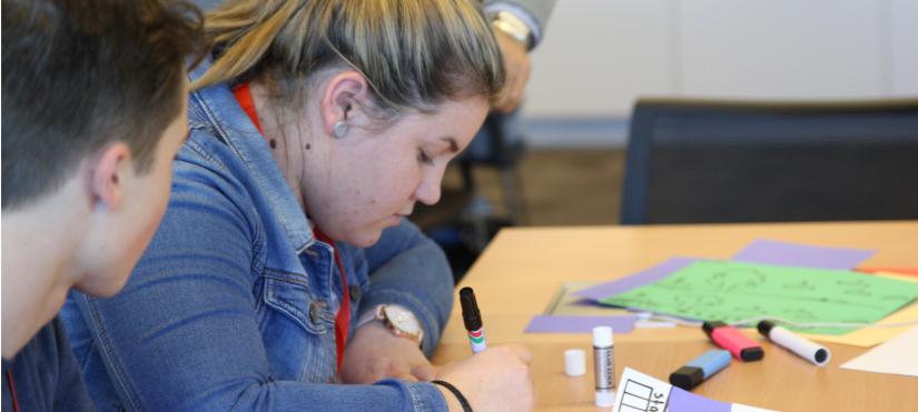 Galuwa student working on a project at a desk