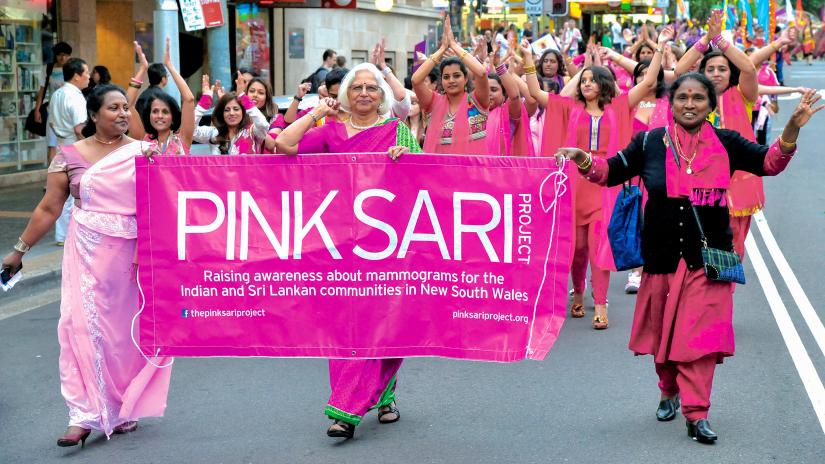 Photo of women in a march supporting the Pink Sari projects