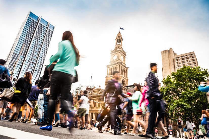 Pedestrians walking near Sydney's Town Hall