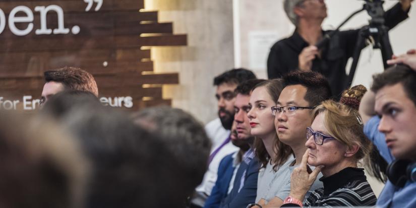 Crowd listening to a presenter