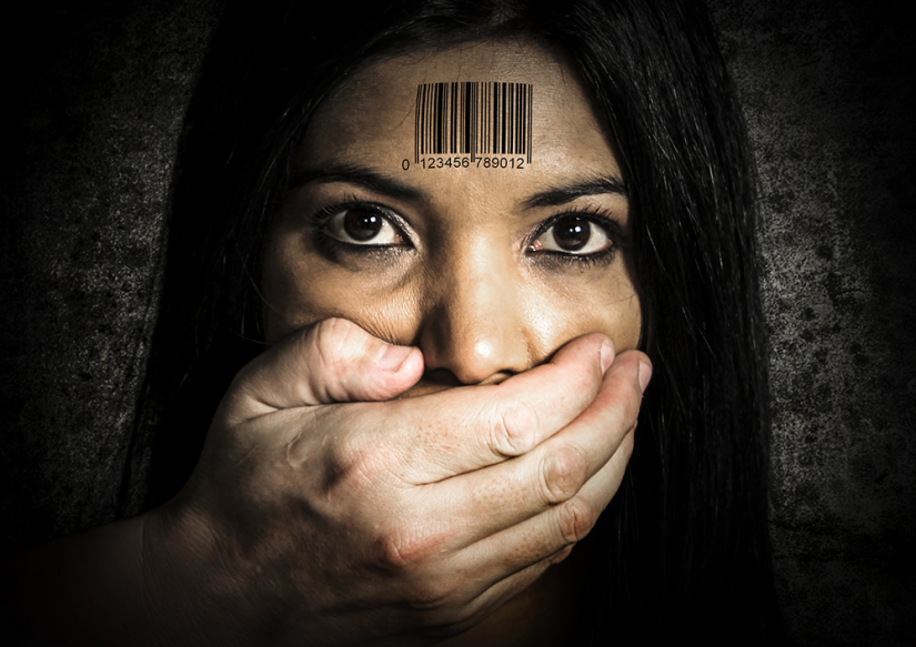 Hand covering woman's mouth, barcode on forhead