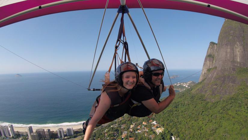 Alana hang-gliding over São Conrado beach in the early morning