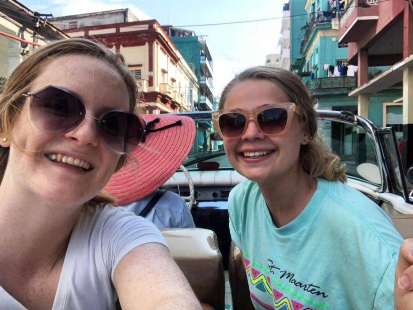 FASS Costa Rica ICS study tour Velvet-Belle and her friend Anik riding in the back of a convertible car