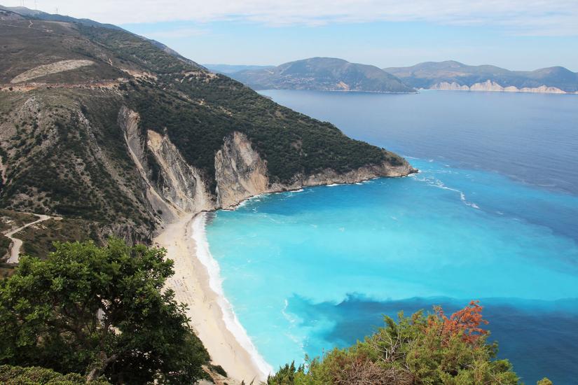 FASS ICS Germany study tour scenic beach with turquise water and large cliffs