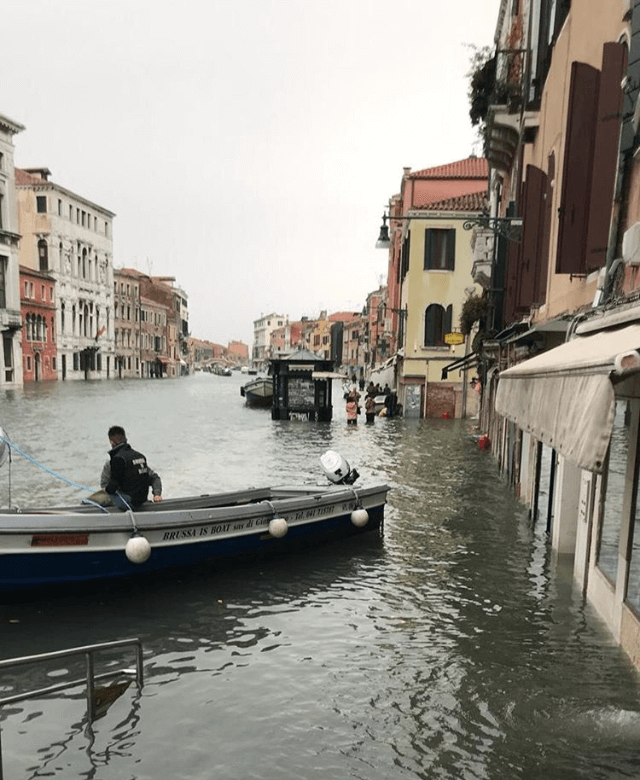 FASS ICS Italy study tour a boat floating on the canal in Venice