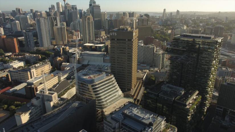 A view of the UTS campus from a drone flyover, showing the Tower and UTS Central under construction