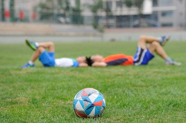 Two boys on football field