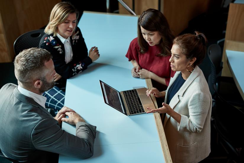 Group of communication executives collaborating 