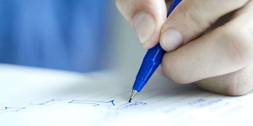 Man writing notes