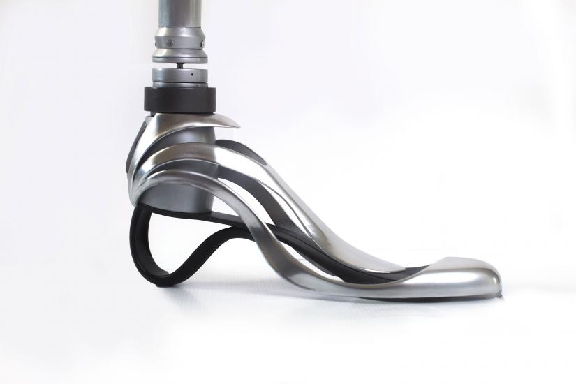 Prosthetic foot with silver shoe attachment