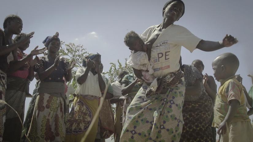 Still from Christel's film Mother: Malawi showing women dancing