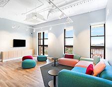 Waiting room at the Kidman Centre, featuring large windows and colourful furniture
