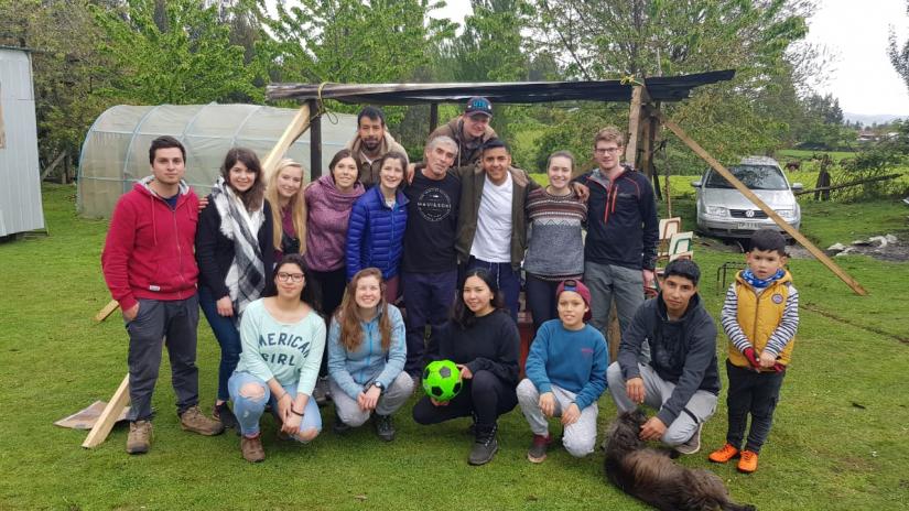 Rochelle with a group of friends at a campsite