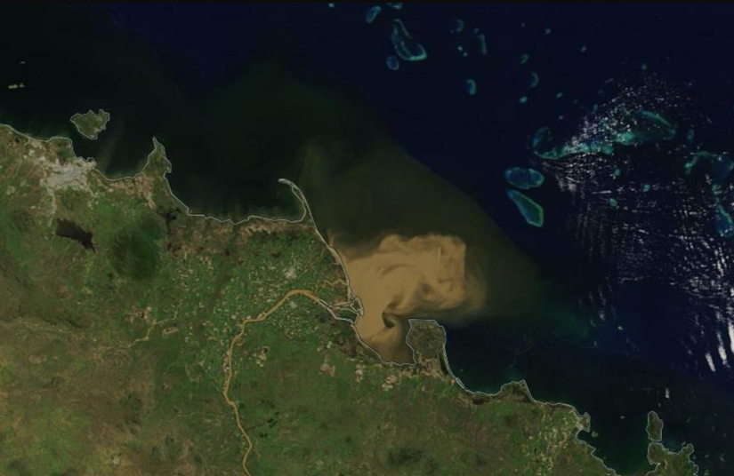 Summer flooding in Australia delivers significant freshwater runoff into the Coral Sea, raising concern for the Great Barrier Reef. Photo: USGS/NASA Landsat