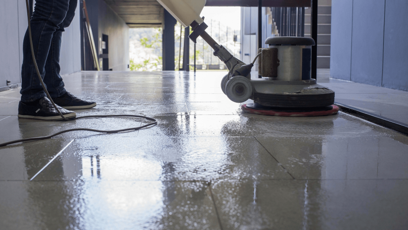 Commercial cleaner cleaning floor