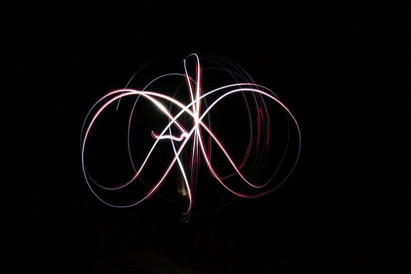 Sparks of light against a dark night backdrop.