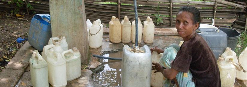 Woman collecting water