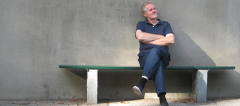 Contemplative man sitting on a bench