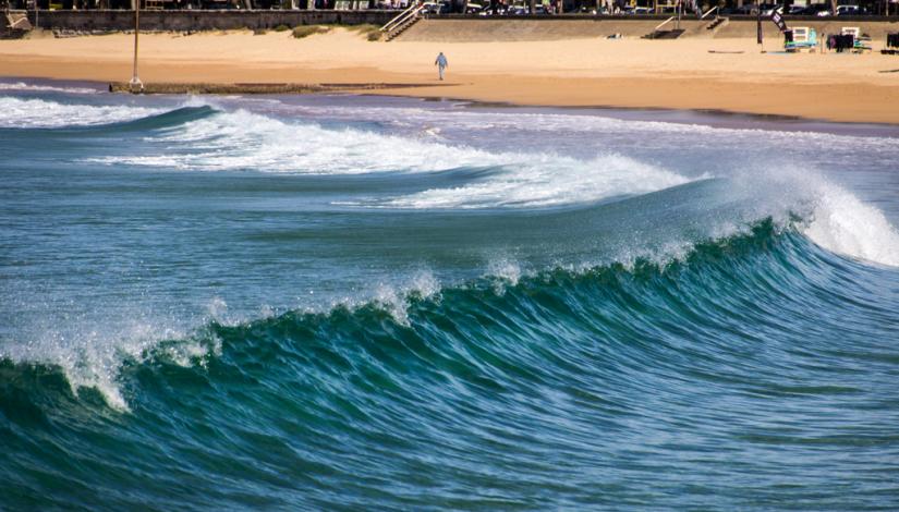 Waves breaking as they approach the shore