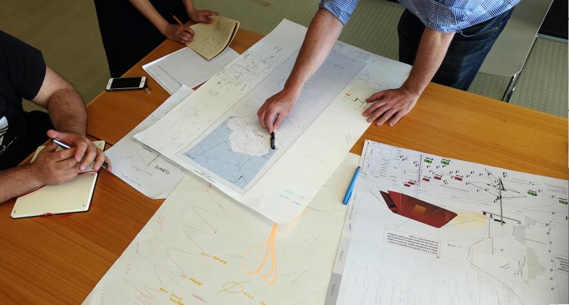 UTS Master of Architecture students and scientists working around a table