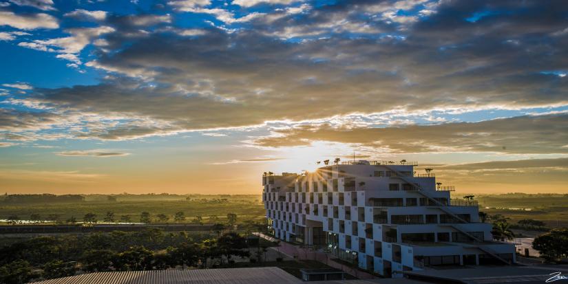 A building illuminated by the setting sun