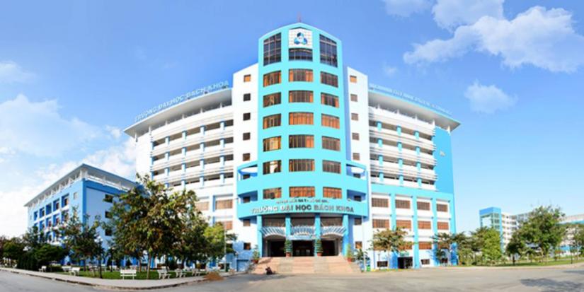 A blue building from a low angle in front of a blue sky