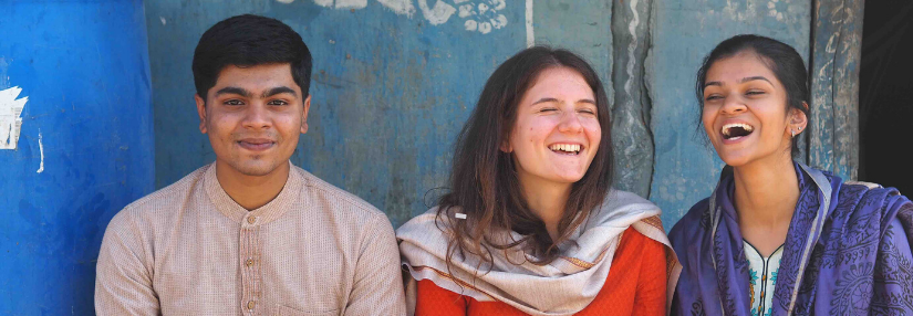 Three students in India during Drishtee Immersion program