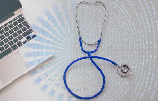 Stethoscope and computer with binary code in background