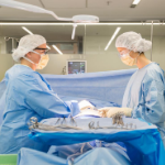 UTS lecturer and student in the Perioperative Nursing lab (operating theatre)