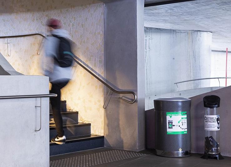 Foyer of the Science building showing bin and battery recycling tube