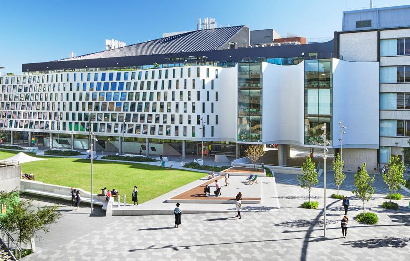 Vicki Sara Building with the alumni green in the foreground