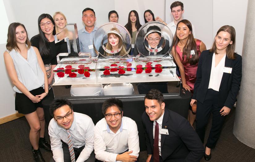 Group of Dr Chau Scholars with ice sculpture