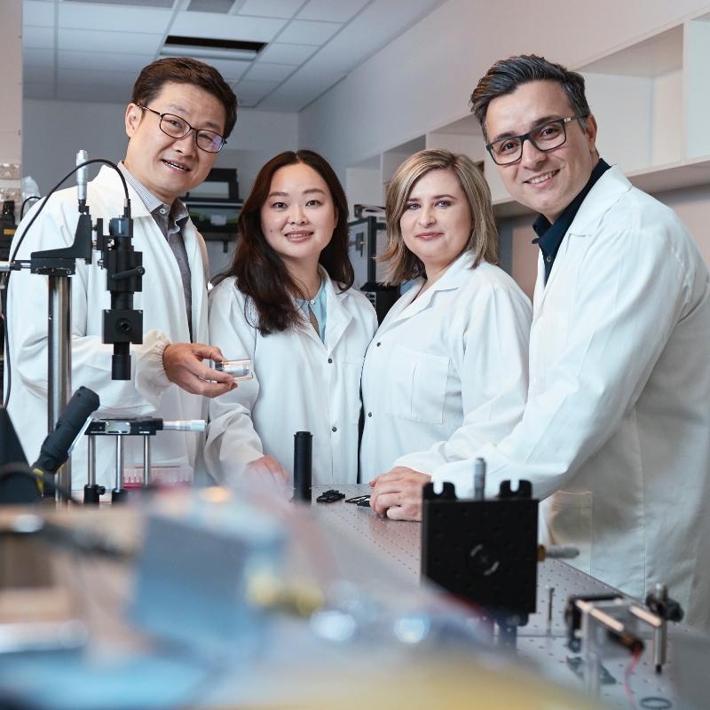 Researchers together in a lab