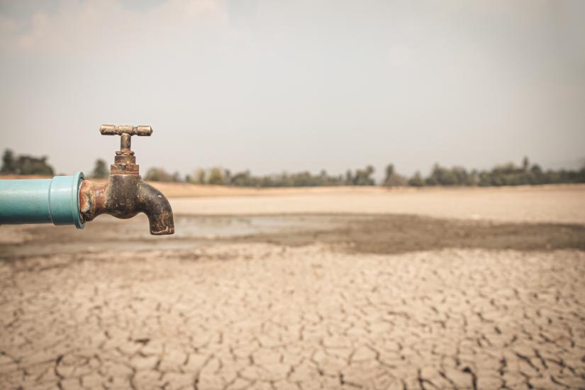 Tap with dry ground behind