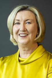 Mrs Jane Clifford smiling and looking at the camera