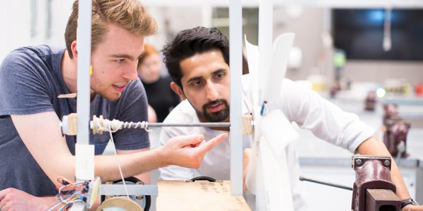 Students in mechanical and mechatronic labs working on project