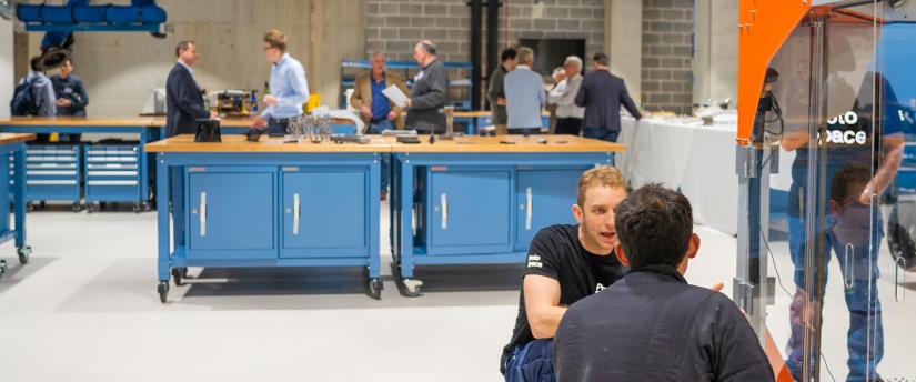 ProtoSpace Technician consulting at 3d printer