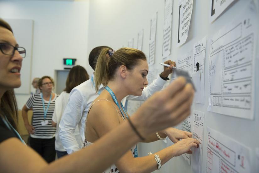 Postgraduate business students in a workshop