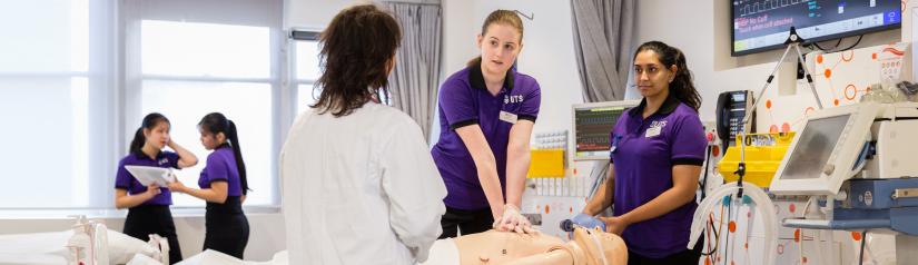 Students learning in a nursing lab