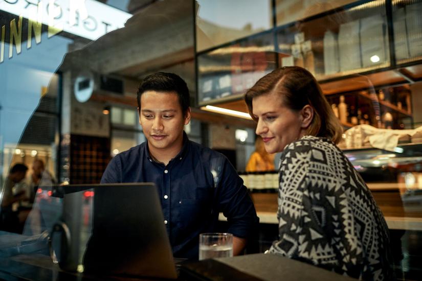 UTS postgrad students viewing content together on laptop