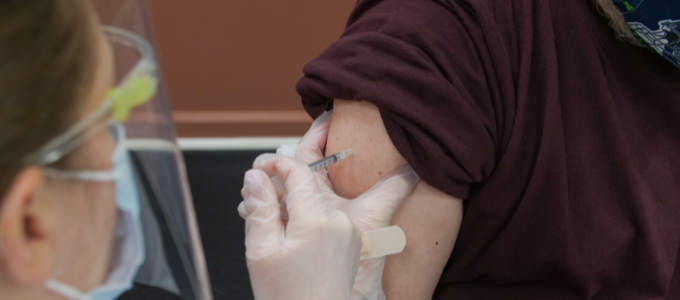 Male patient receives vaccination