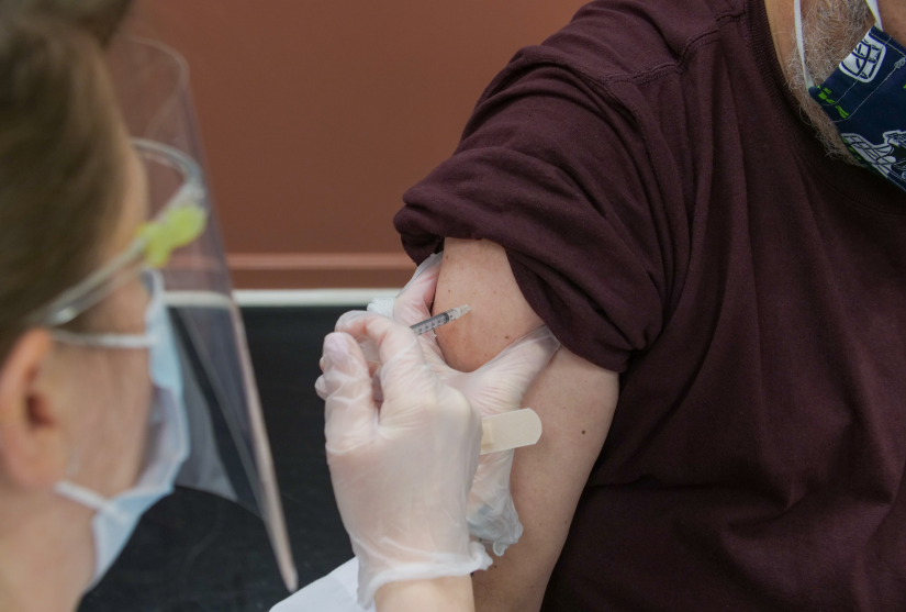 Male patient receives vaccination