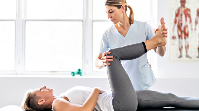 A female physiotherapy with a female patient