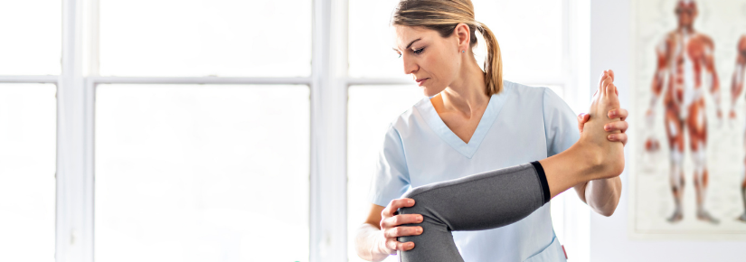 A female physiotherapy with a patient