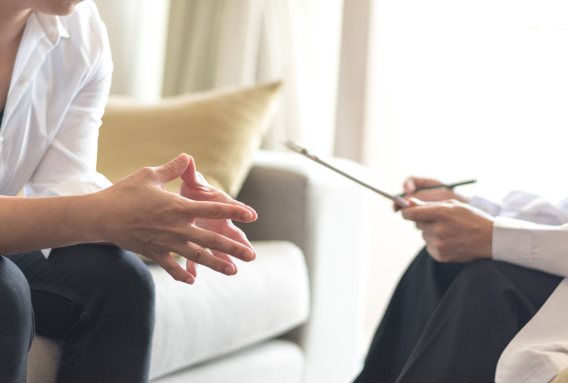 A patient sitting with a therapist