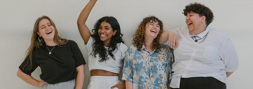 Group of students laughing together