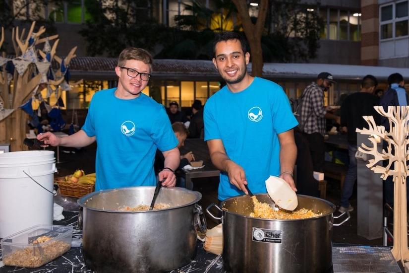 SDG Two people serving food at Blue Bird Brekkie and Night-owl Noodle Bar